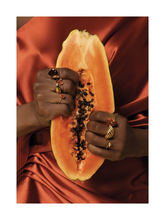 Squeezing Papaya Poster 0