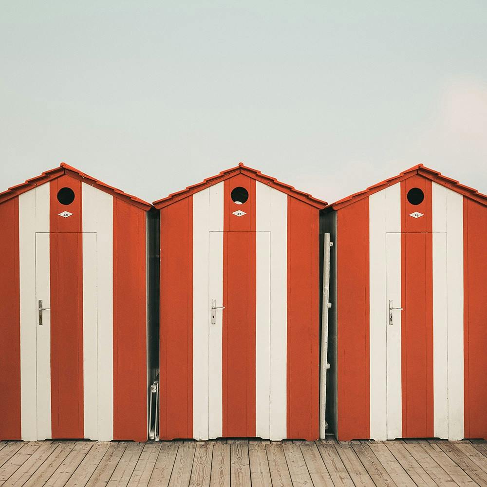 Striped Beach Huts Poster 0