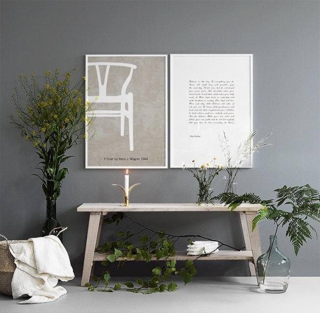 Prints with watercolour art as well as a design chair, makes a picture collage
