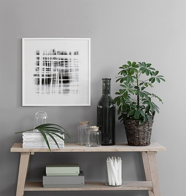Abstract art and typographic prints in a picture wall