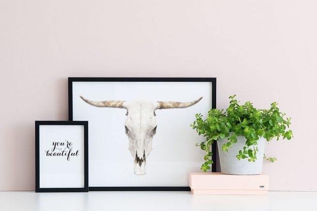 Posters for pink interior design with a horn and stylish pots