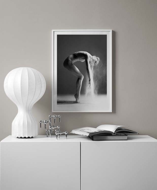 Black and white print in photographic clean design in gold frame