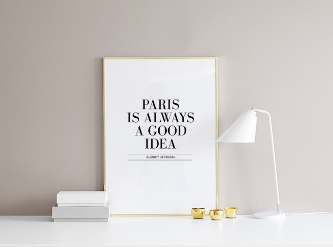 Trendy stylish typography poster in a gold frame for modern interior design