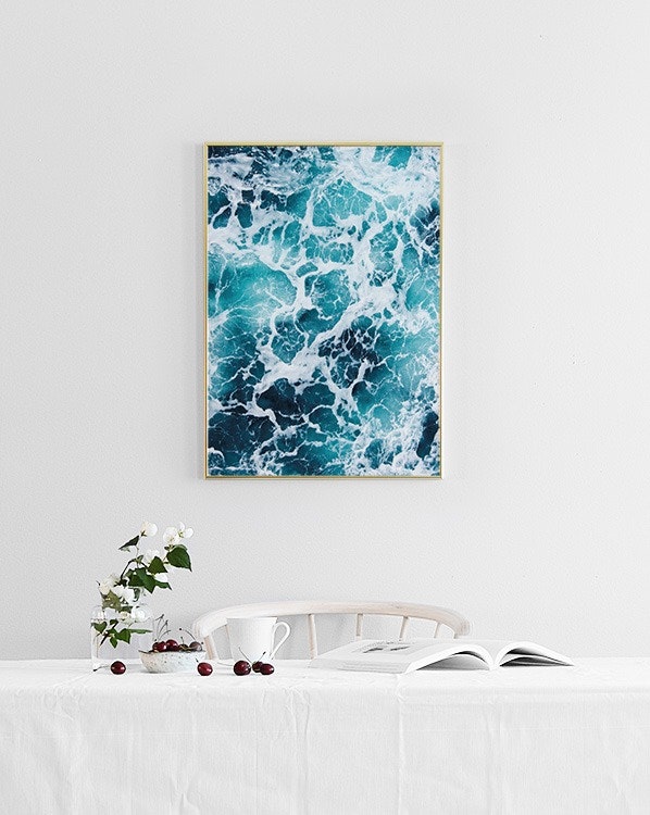 Poster with foaming ocean water. Stylish on a picture wall in every room.