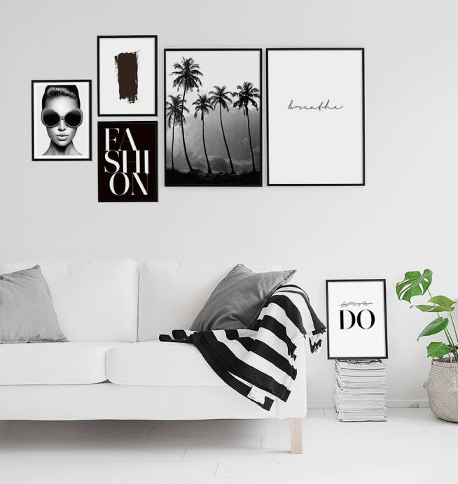 Cuadros en blanco y negro con fotografía artística en una decoración de pared